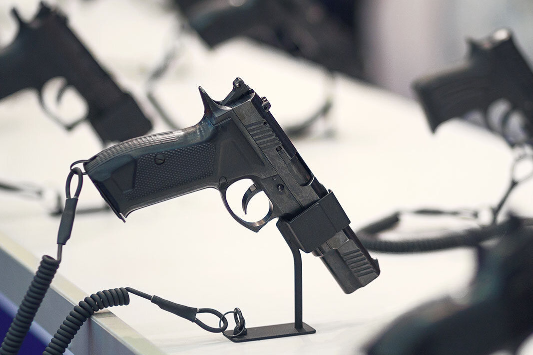 Guns on a display table.