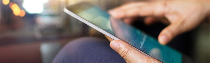 A man holding a tablet