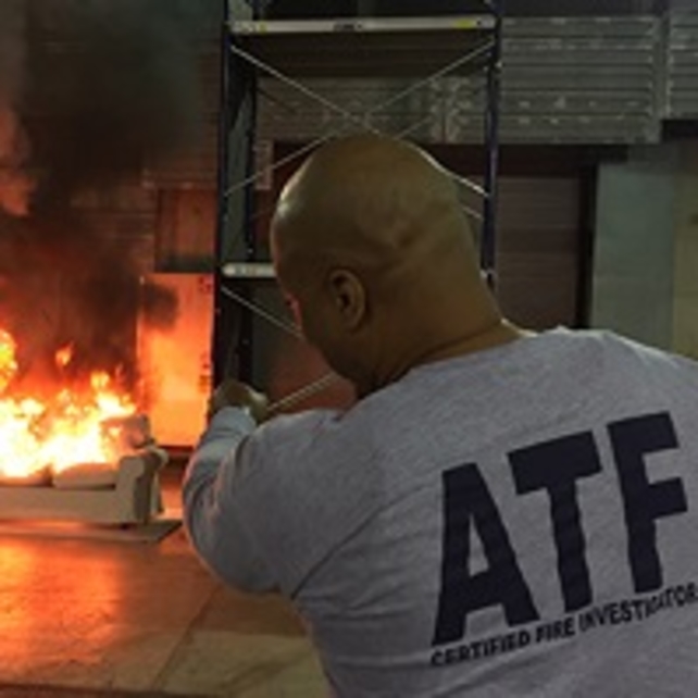 Fire investigator looking at a fire