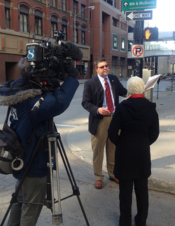 John doing an interview on the street